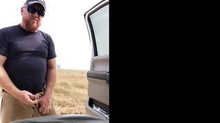 Taking a leak in the country.