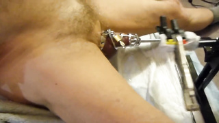 Fuck machine sounding my cock in chastity cage
