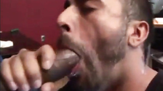 He sucks a big black cock