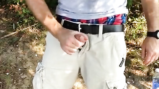 Public getting off in the forest - fapping off by the water and spunking.