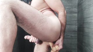 Giant faux-cock caboose wide open in the douche