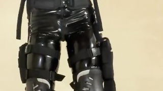 Condom fellow dressed in rubber gear