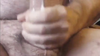 Dad knocks out a big load of spunk 7