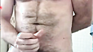 Hairy Bear Strokes His Cock in the Tub