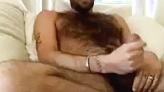 Wooly Bear Milks His Hefty Rod on Web cam