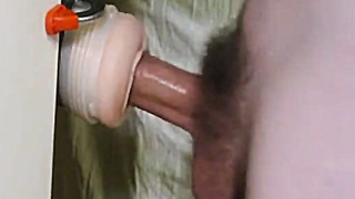 Grimacing Climax with a Fleshlight