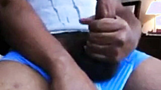 Suspended Black Guy Faps His Hefty Lollipop