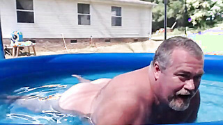 Bearded Father Plays Bare by the Pool