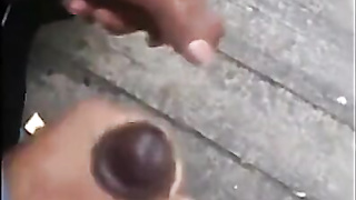 Black amateurs stroke monstrous dicks outdoors