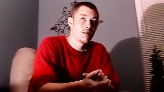 Fledgling prick rider with tats plays with his fur covered lollipop