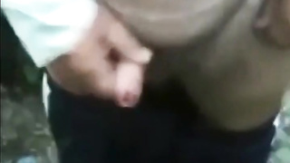 Aged stud milking his uncircumcised fuckpole outside